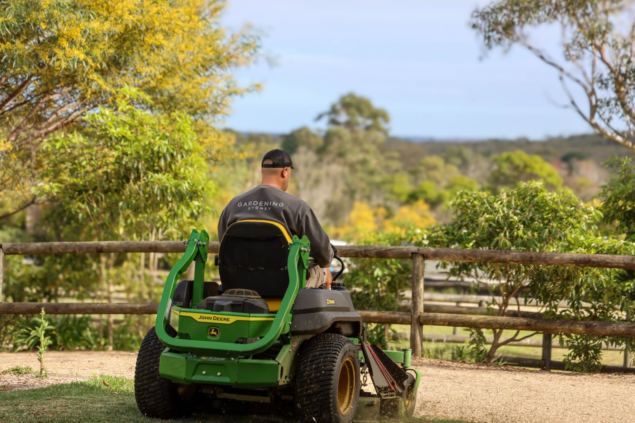 Gardening Sydney ride-on mower on a large property